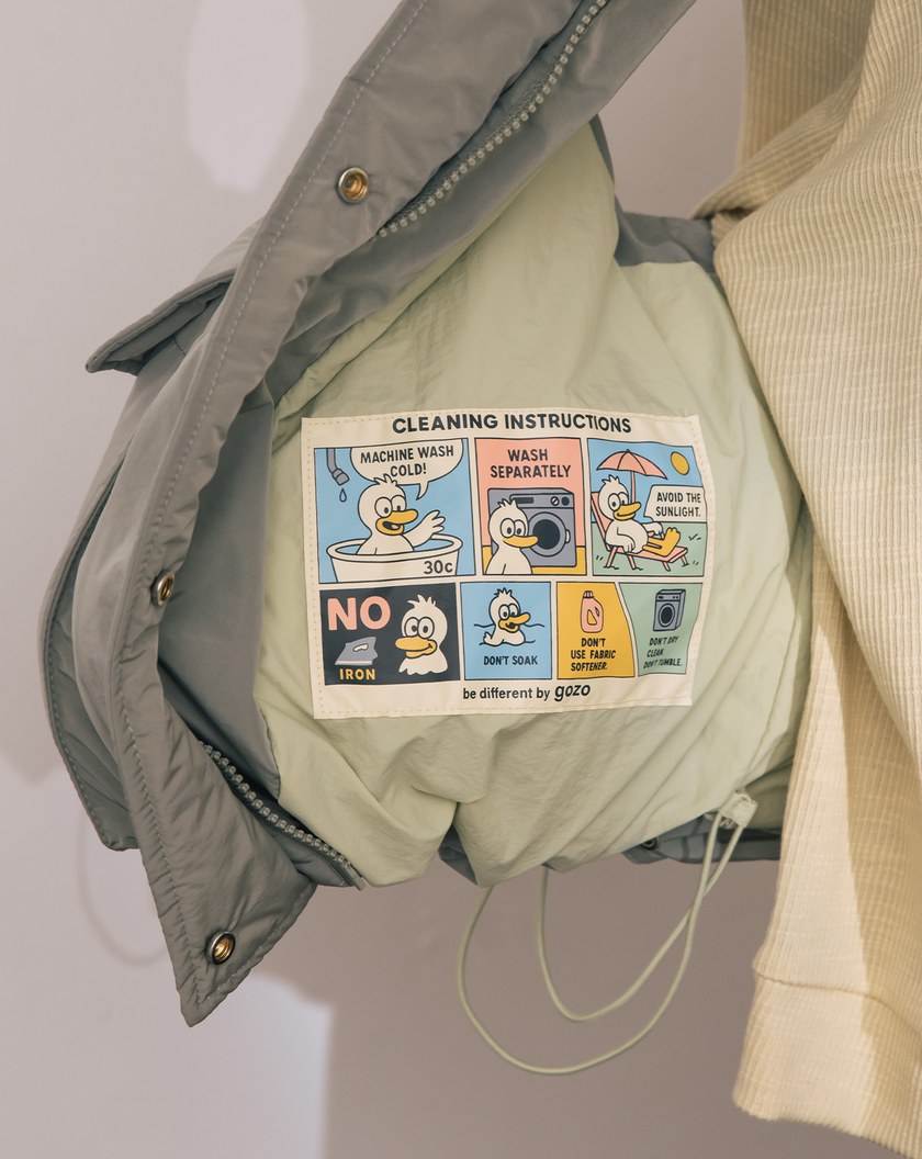 ➤霧綠大口袋立體廓型連帽羽絨背心