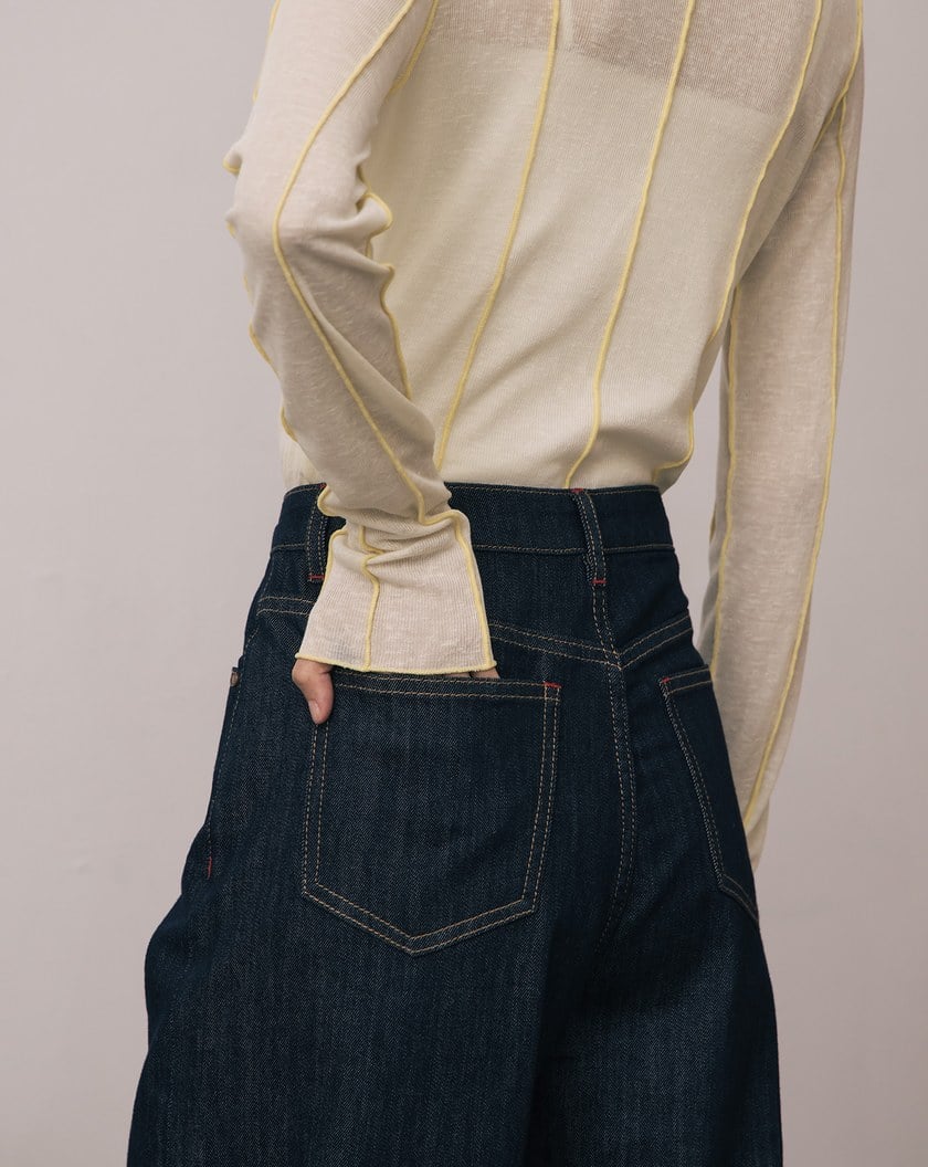 A|大反折品牌標語繡花天絲水洗牛仔寬褲