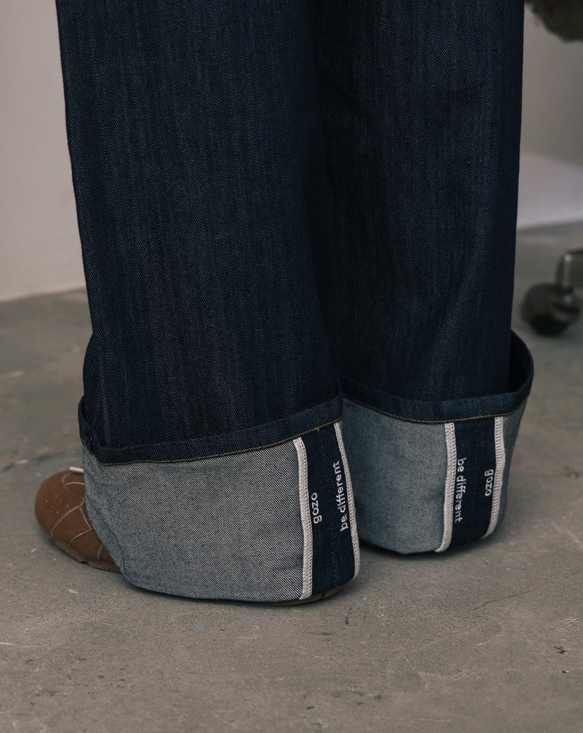 A｜大反折品牌標語繡花天絲水洗牛仔寬褲