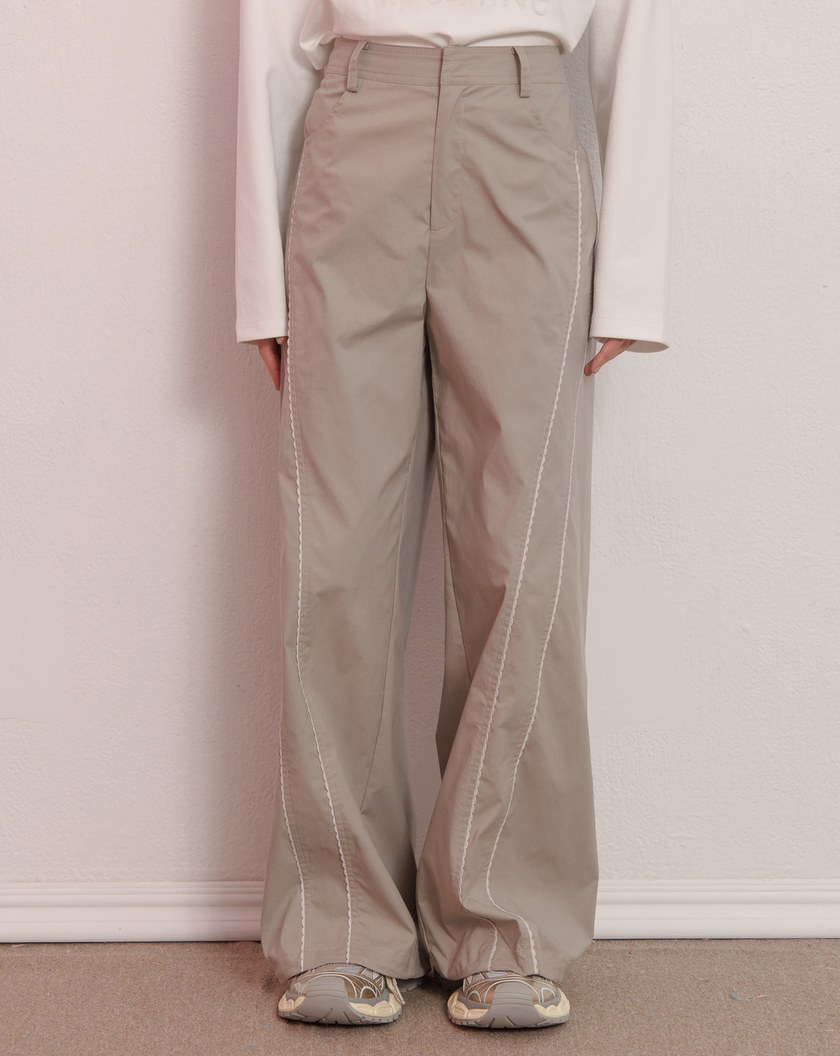 S型花邊剪接造型抽繩寬褲(兩色)