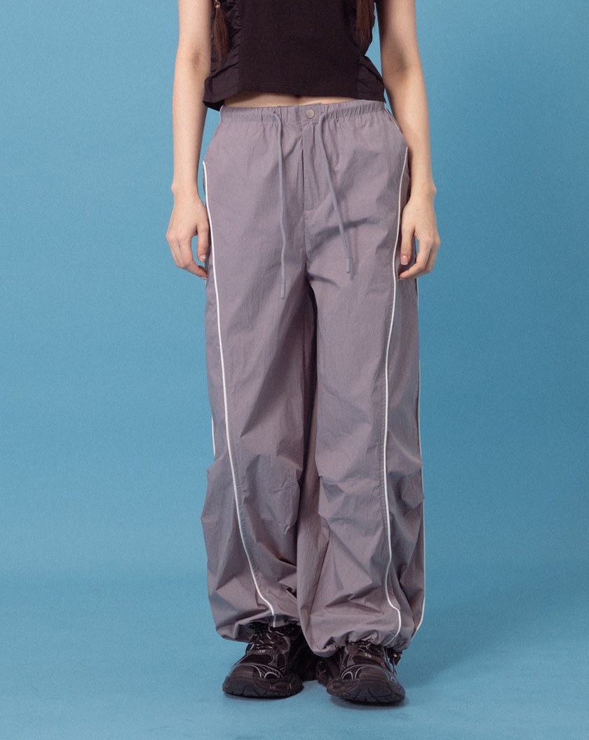 A｜立體打褶反光線條運動長褲(兩色)