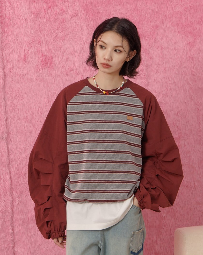 ➤條紋拼接造型袖抽繩大學T(兩色)