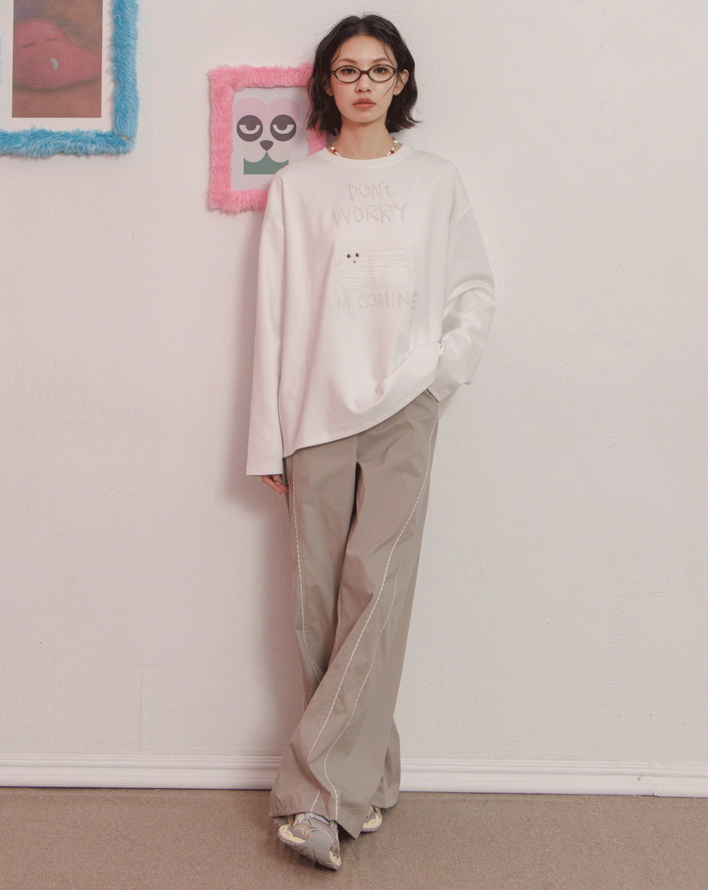 S型花邊剪接造型抽繩寬褲(兩色)