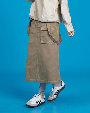 不對稱壓線大口袋吊帶裙(兩色)