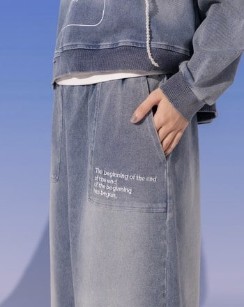 水洗牛仔口袋造型標語繡花長裙