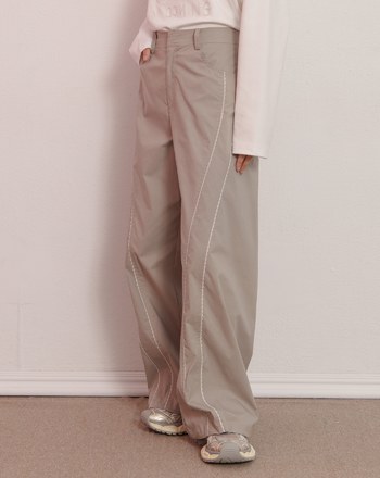 S型花邊剪接造型抽繩寬褲(兩色)