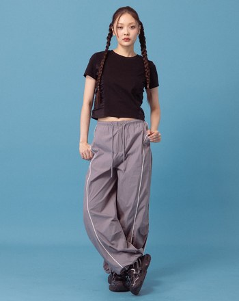 A｜立體打褶反光線條運動長褲(兩色)