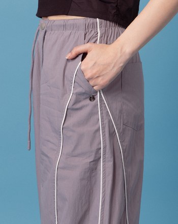 A｜立體打褶反光線條運動長褲(兩色)